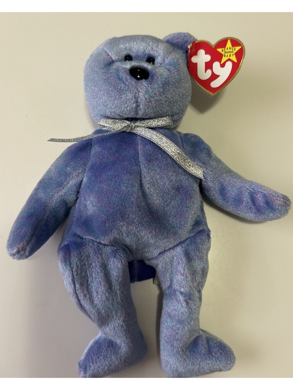 Ty Beanie Baby Clubby II DOB March 9, 1999. Purple Hue. Silver Neck Ribbon. NWT